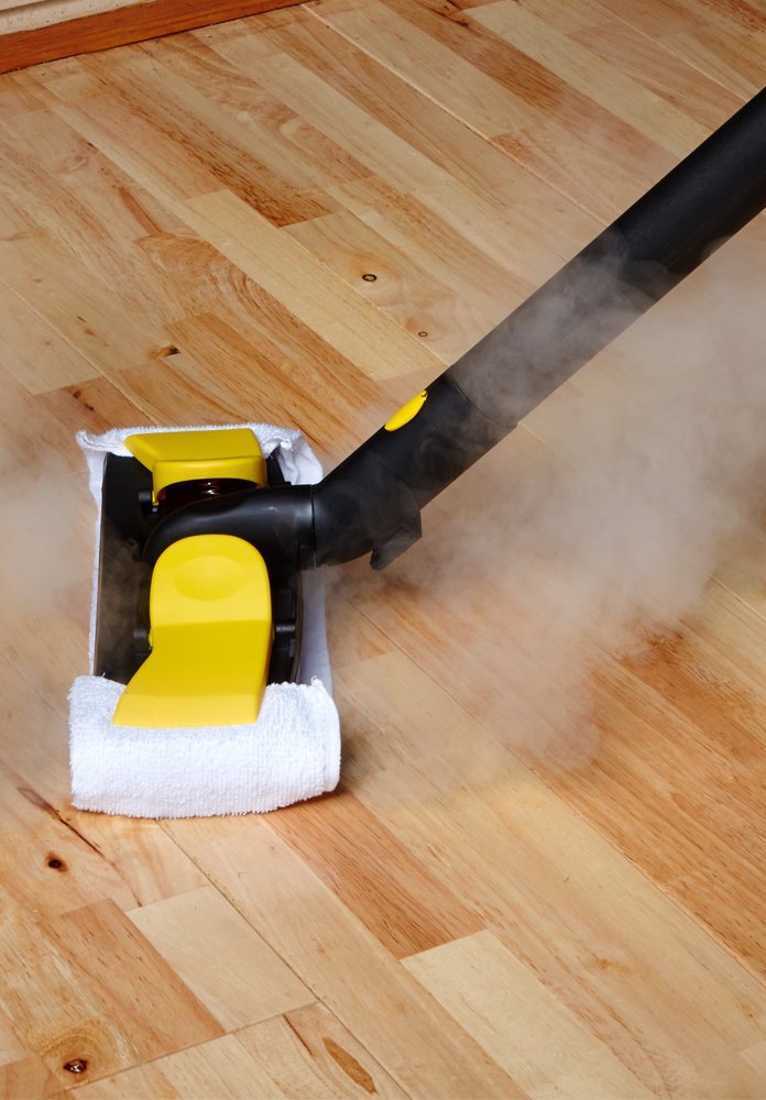 Little yello steam cleaning hardwood floor